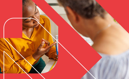 ACE Fitness Nutrition Specialist discussing a nutrition label with an older female client to support healthy eating habits