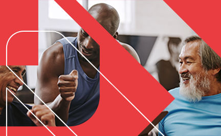 ACE Senior Fitness Specialist celebrating progress with older client in a small group fitness environment